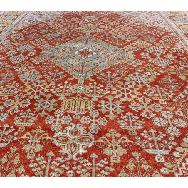 Early 20th Century Antique Persian Joshegan Rug With Geometric Medallion Design in Rust and Ivory For Sale - Image 4 of 11