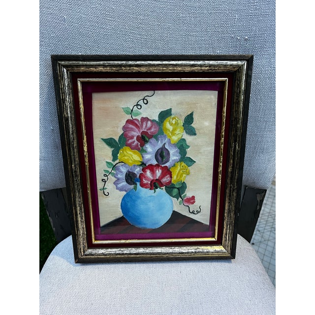 Up for consideration is a beautiful vintage framed floral arrangement in a vase painting. This would look lovely in your...