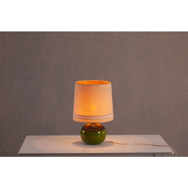 This sculptural ceramic table lamp was designed by ceramist Renée Neue for Hutschenreuther and handcrafted in West Germany...