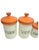Mid-Century canister set of four in off white ceramic with bright 60's orange lids. Four canisters in all, all in good...