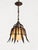 An unusual Spanish pendant light from the 1950s, featuring hand-worked, copper-plated iron leaves arranged around a white...