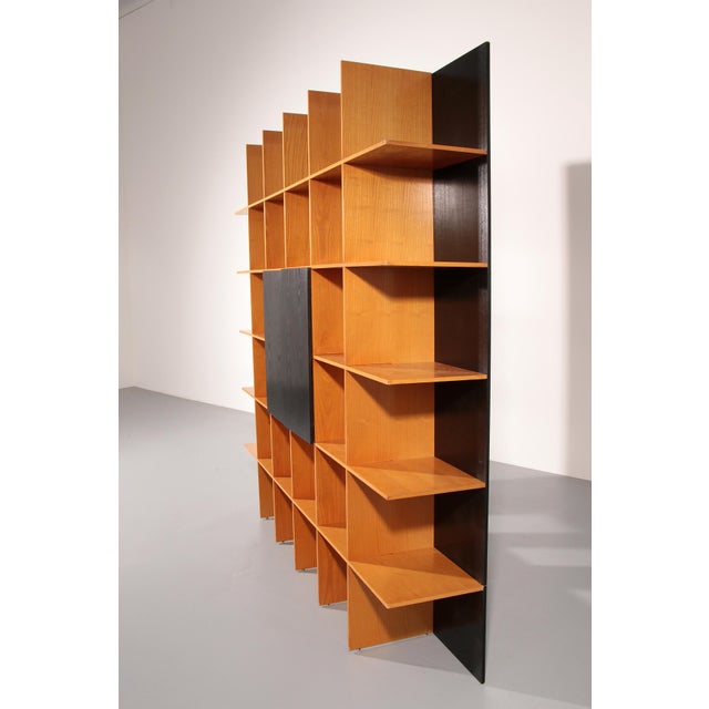 This elegant two-tone bookcase, designed by Roberto Pamio and Renato Toso for Stilwood in 1972, captures the spirit of...