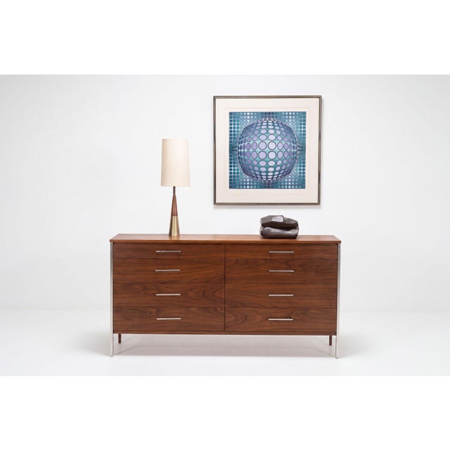 Paul McCobb Linear Group for Calvin 8-Drawer Dresser, 1955 Executed in richly grained walnut with brushed aluminum...