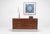 Paul McCobb Linear Group for Calvin 8-Drawer Dresser, 1955 Executed in richly grained walnut with brushed aluminum...