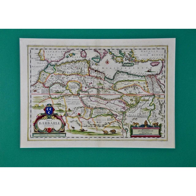 This original attractive 17th century hand-colored map of North Africa entitled "Nova Barbariae Descriptio" by Johannes...