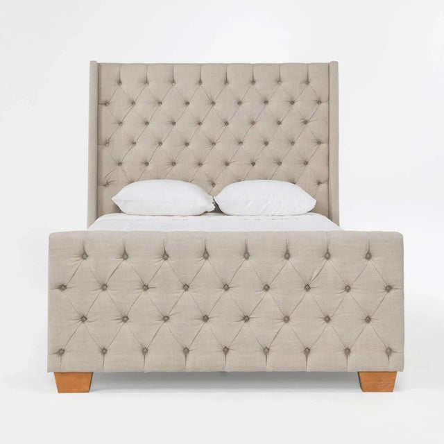 Beautiful tufted linen upholstered queen size bed frame with hardwood legs. Classic simple design headboard and footboard...