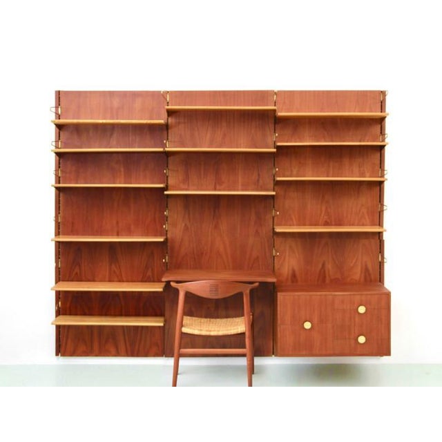 Modular shelving system bo71 in teak by finn juhl for bovirke in the 1960s. Comprising 3 columns, 4 rules, 1 unit with 6...