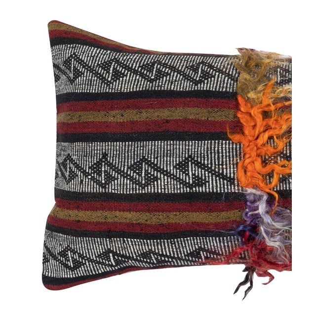 Add a touch of history and warmth to your space with this vintage handmade Turkish wool kilim cushion cover. Crafted from...