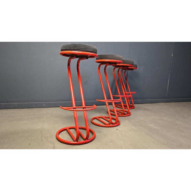 Set of 4 red lacquered metal bar stools with black fabric seat pads. 1980s - Italy Good overall condition Dimensions:...