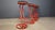 Set of 4 red lacquered metal bar stools with black fabric seat pads. 1980s - Italy Good overall condition Dimensions:...
