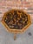 This 19th Century English Bamboo Side table features a delightful variety of butterflies decoupaged onto the top shelf....