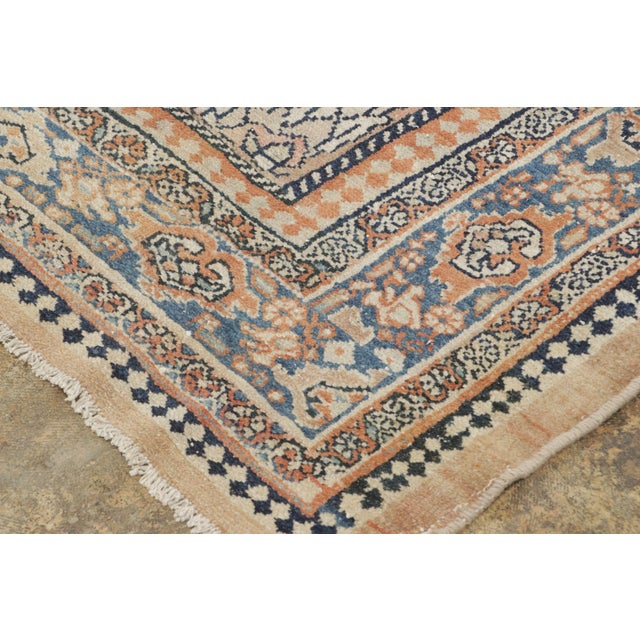 This antique 9x15 Persian Hamadan rug is a remarkable late 19th-century work distinguished by its elegant all-over floral...
