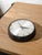 An original Magneta clock, once a clock in a post office, telephone exchange, or factory setting, finished in satin black...