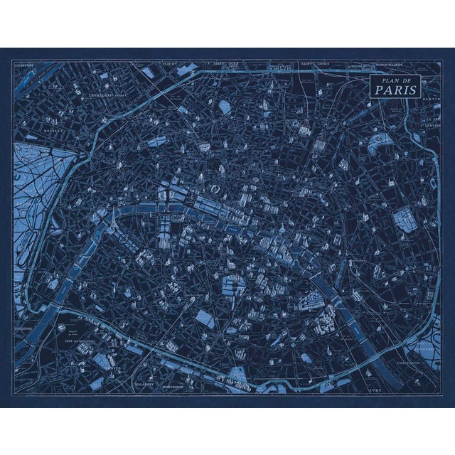 A blueprint version of a 1925 plan of Paris, showing many of its famous monuments - including the Eiffel Tower, which was...