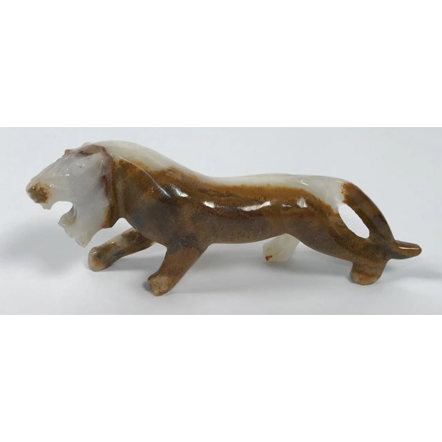 Vintage onyx figure of a tiger on the prowl. This guy may be missing part of one front paw, making him all the more...