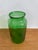 Add a layer of rustic elegance to your space with this stunning Large Green Glass Pickle Jar. This vintage piece features...
