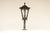 Handcrafted lantern made of cast and wrought copper. over decades, cast copper develops a dark brown to greenish patina...
