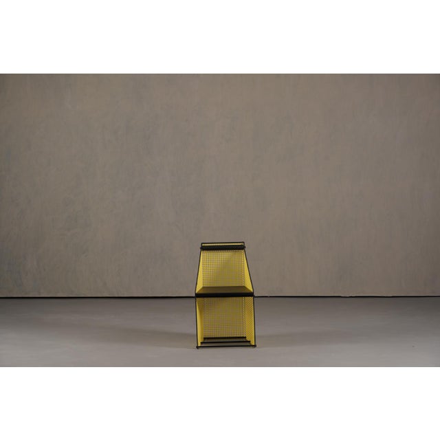 A vintage yellow metal chair designed by Peter Preller in Germany during the 1980's. The producer is unknown. Made from...