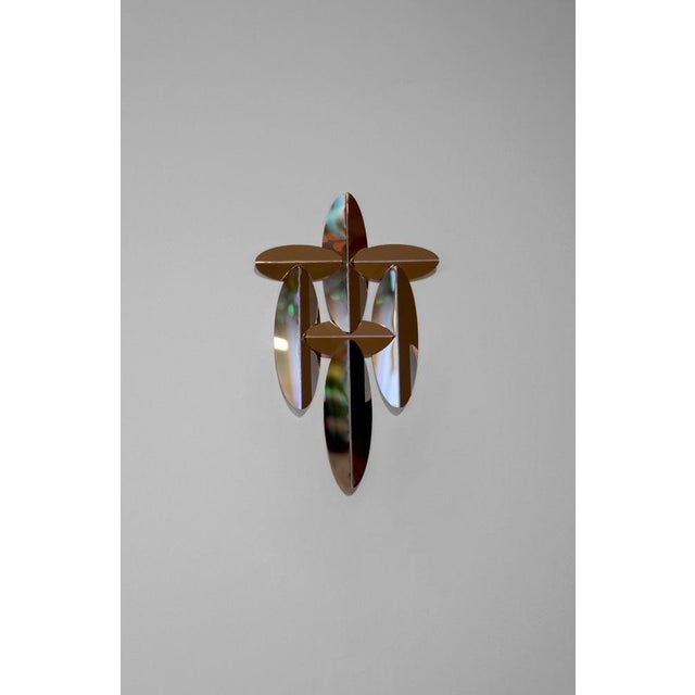 Ino small wall mirror in polished aluminum by martens & visser dimensions: d 5 x w 21 x h 33 cm. Materials: aluminum....