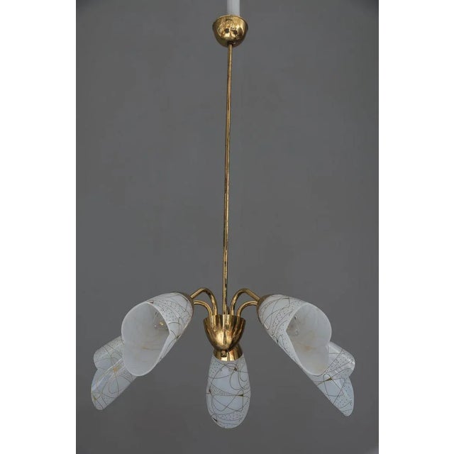 Vintage chandelier Italian 1960s Brass and Lucite Original condition Original shades. European Plug (up to 250V).The...