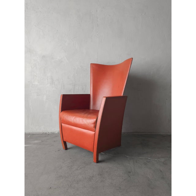 THIS chair. If a meticulous piece of design with a pop of color is what you've been looking for to compliment your space,...