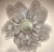 The sculptural Feyre Iron Poppy Mirror by Studio A Home for Global Views offers a whimsical, dimensional interpretation of...