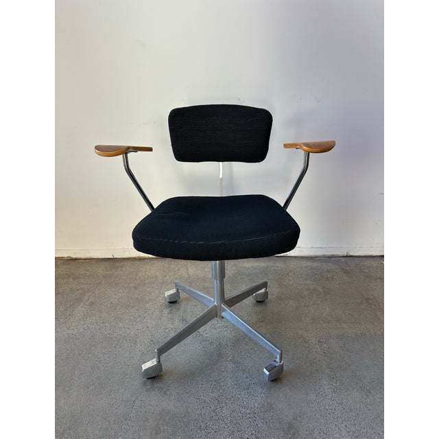 Very cool designer task chair from Labofa, 1960s vintage swivel chair with original black fabric seat and original black...