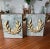 Gorgeous gilt bronze laurel wreaths on a beautiful green stone background. This pair is heavy in both weight and meaning.
