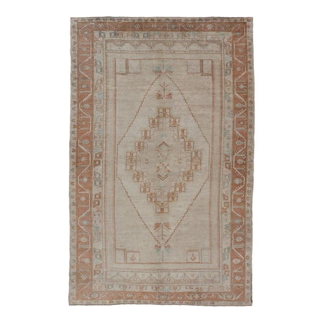 Mid 20th Century Taupe Background Turkish Vintage Oushak Rug With Tribal Medallion Design For Sale