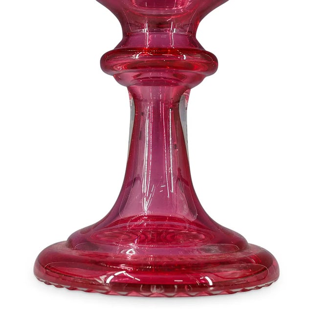 Elegant early 20th-century Italian centerpiece by Salviati, crafted in richly colored ruby-pink crystal with extensive cut...