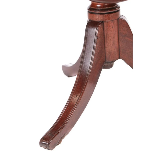 19th century antique Regency mahogany antique two tier dumbwaiter with two drop flaps to each tier, supported by a turned...