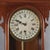 An oversized antique calendar wall clock, crafted in the American Victorian style, circa 1890. The case is constructed...