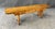 This vintage pegged maple bench features a solid plank top secured with visible wooden pegs, showcasing honest...