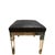 A refined bench ottoman from the Caracole Classic collection, featuring a sleek rectangular silhouette elevated by a...