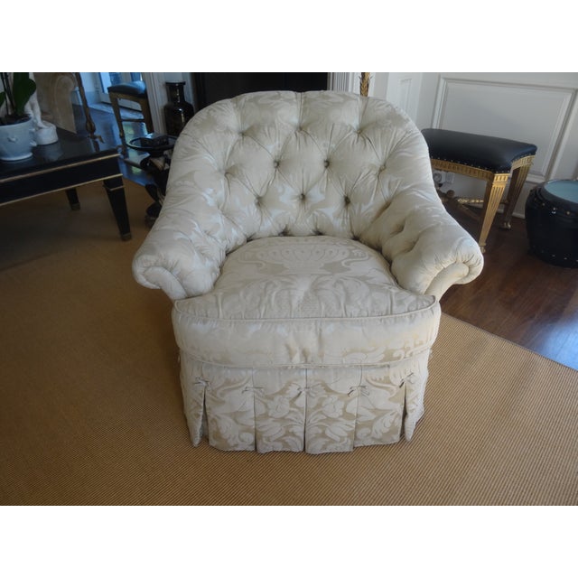 A luxurious Michael Taylor Style Lounge Chair with Pleated Airy + Skirt, Button Tufted.