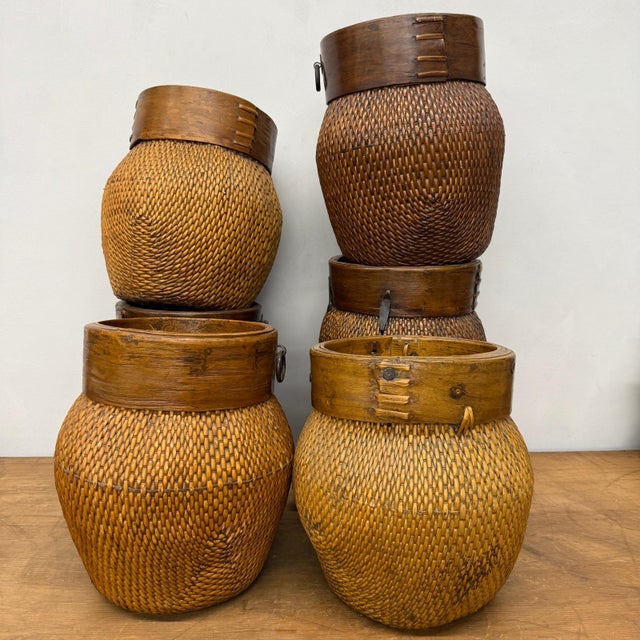 "About This Piece About This Piece Warm, organic, and full of character, this vintage Southeast Asian storage jar blends...