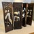 This six panel wooden folding screen is hand carved with Asian designs. Each panel features a different scene. Small...