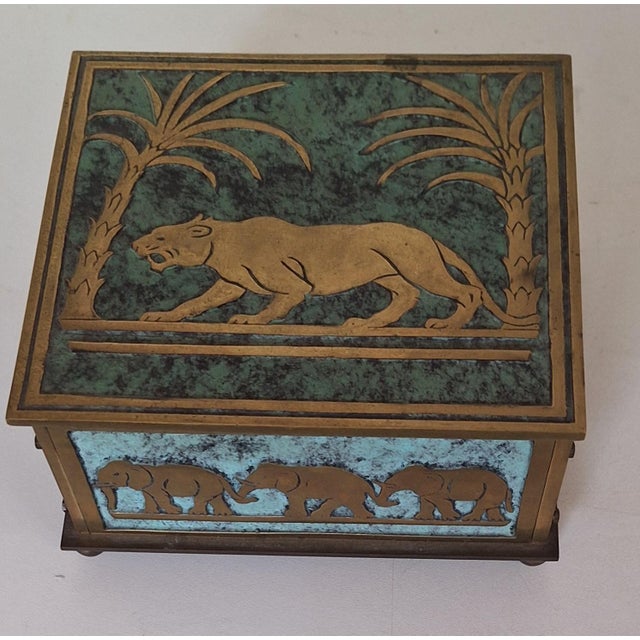 Art Deco Brass Lidded Box with Polished African Motifs, 1930s, in Very Good conditions. Designed 1920 to 1949