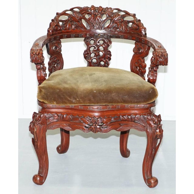 We are delighted to offer for sale this stunning hand-carved solid elm lacquered throne armchair A really rare an expertly...