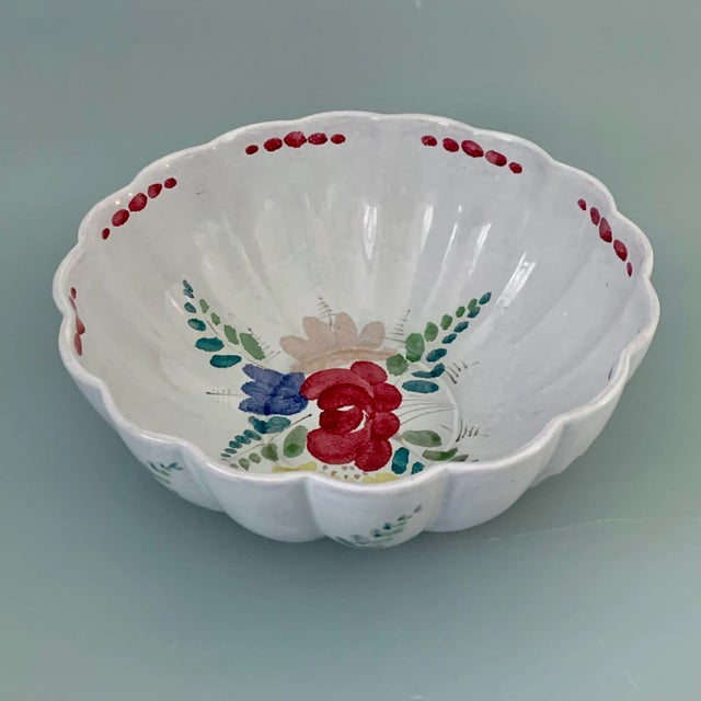A vintage, stunning/mint condition, hand painted glazed ribbed terra cotta salad bowl produced by Arabia Finland. This is...