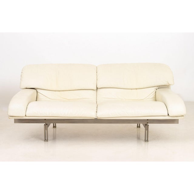 Saporiti Italia Cream Leather Upholstered Two-Seat "Wave" Sofa, designed by Giovanni Offredi, Fratelli Saporiti label...