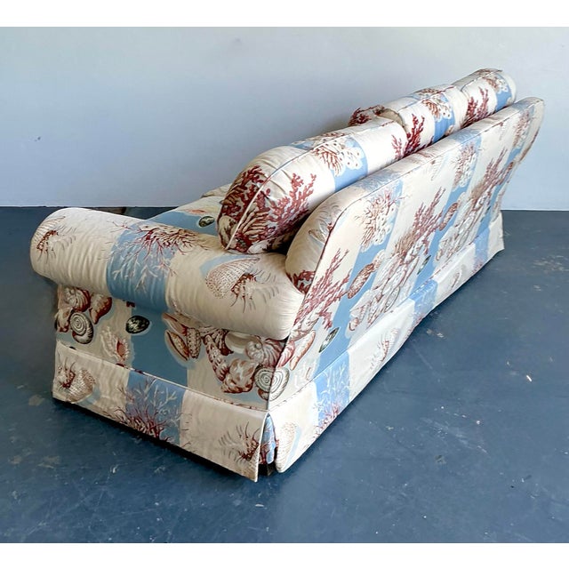Embrace the serene charm of the seaside with this captivating vintage three-seat sofa, featuring a whimsical undersea...