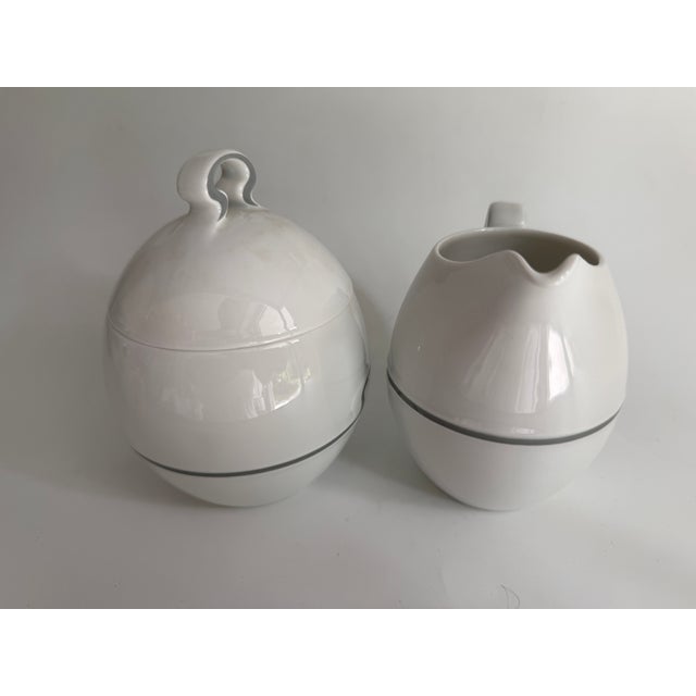 Item: Sugar bowl 0.3 L and creamer 0.27 L Manufacturer: Rosenthal Series: Asimmetria Decoration: Slate Material: Porcelain...