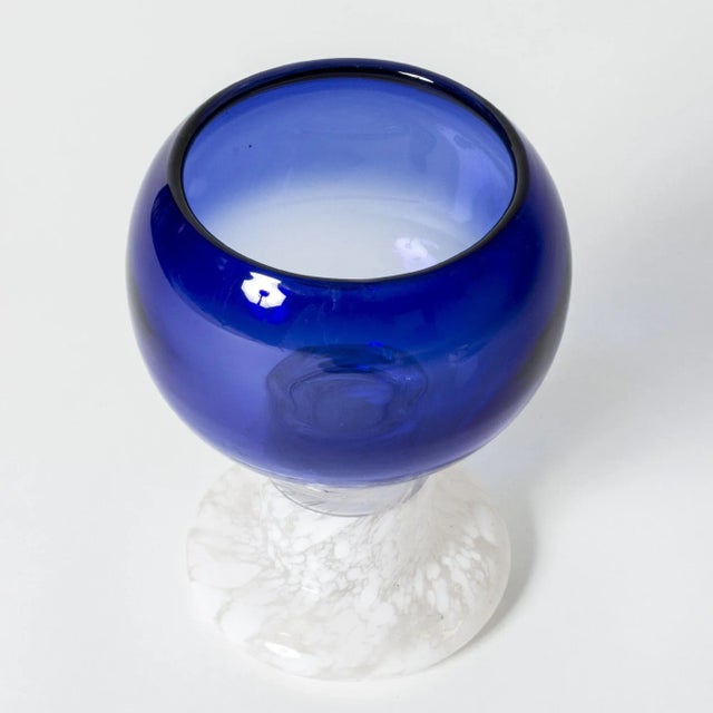 Glass “Pokaali” goblet by Kaj Franck. Vibrant blue glass bowl with a white base. This piece has an attribution mark, I am...