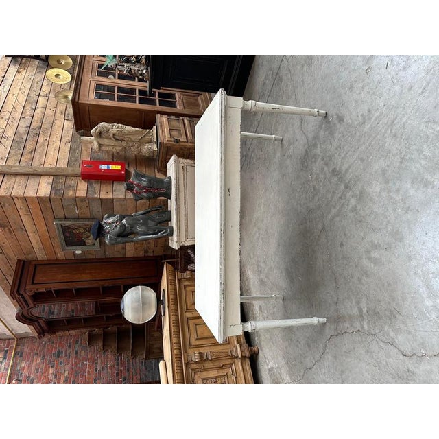 This distressed table has been fully restored. Perfect as a kitchen table or desk, with a lovely original patina. Height...