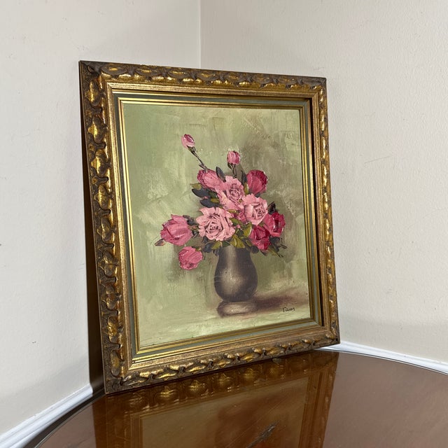 This is an original, artist-signed vintage oil painting featuring a beautiful floral still life. The artwork displays a...