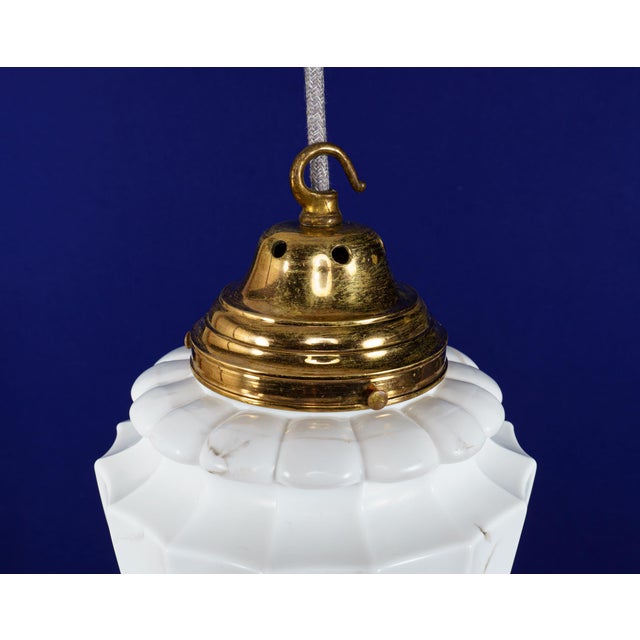 A large vintage – nearly antique – mouth-blown opaline glass shade with neoclassical-style moulded decoration. The surface...