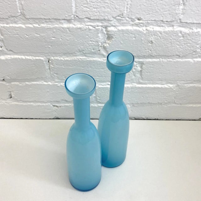 Holmegaard Cased Glass, Pair of Blue Carnaby Vases, 12” x 5” These expertly crafted vases feature multiple glass layers,...