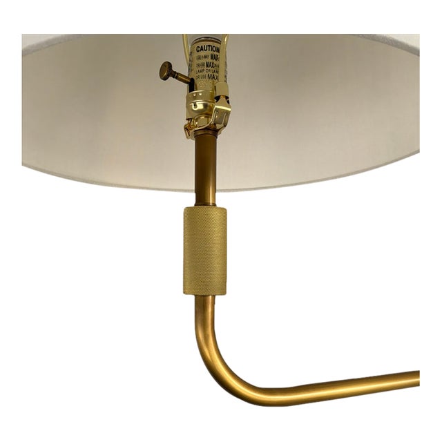Stylish Arteriors Simpson Floor Lamp. Brass body, off-white shade. Original Retail $2260. Showroom floor sample.
