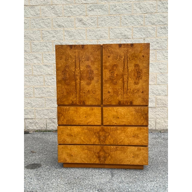 Lane tall dresser/gentleman’s chest, circa 1970s. Burl wood veneer fronts with warm honey tone. Clean rectilinear case...